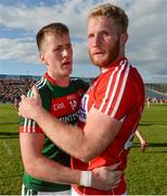 22 July 2017; Cillian O'Connor of Mayo with Ruairí Deane of Cork after the GAA Football All-Ireland Senior Championship Round 4A match between Cork and Mayo at Gaelic Grounds in Co. Limerick. Photo by Piaras Ó Mídheach/Sportsfile