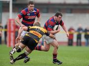24 March 2012; Ben Barclay, Clontarf, in action against Liam Óg Murphy, Young Munster. Ulster Bank League Division 1A, Young Munster v Clontarf, Tom Clifford Park, Limerick. Picture credit: Diarmuid Greene / SPORTSFILE
