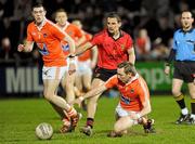 24 March 2012; Paul Duffy, Armagh, in action against Daniel Hughes, Down. Allianz Football League, Division 1, Round 6, Armagh v Down, Morgan Athletic Grounds, Armagh. Photo by Sportsfile