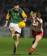 24 March 2012; Graham Reilly, Meath, in action against Niall McKenna, Tyrone. Allianz Football League, Division 2, Round 6, Tyrone v Meath, Healy Park, Omagh, Co. Tyrone. Picture credit: Oliver McVeigh / SPORTSFILE