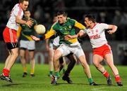 24 March 2012; Tom Walsh, Meath, in action against Aidan Cassidy and Aidan McCrory,  Tyrone. Allianz Football League, Division 2, Round 6, Tyrone v Meath, Healy Park, Omagh, Co. Tyrone. Picture credit: Oliver McVeigh / SPORTSFILE