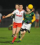 24 March 2012; Cathal McCarron, Tyrone, in action against Donnacha Tobin, Meath. Allianz Football League, Division 2, Round 6, Tyrone v Meath, Healy Park, Omagh, Co. Tyrone. Picture credit: Oliver McVeigh / SPORTSFILE