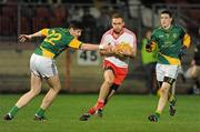 24 March 2012; Aidan Cassidy, Tyrone, in action against Conor Gillespie and Donnacha Tobin, Meath. Allianz Football League, Division 2, Round 6, Tyrone v Meath, Healy Park, Omagh, Co. Tyrone. Picture credit: Oliver McVeigh / SPORTSFILE