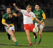 24 March 2012; Owen Mulligan, Tyrone, in action against Cian Ward, Meath. Allianz Football League, Division 2, Round 6, Tyrone v Meath, Healy Park, Omagh, Co. Tyrone. Picture credit: Oliver McVeigh / SPORTSFILE
