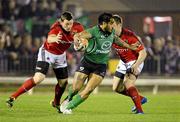 24 March 2012; Henry Fa'afili, Connacht, is tackled by Denis Hurley, left, and Johne Murphy, Munster. Celtic League, Connacht v Munster, Sportsground, Galway. Picture credit: Brendan Moran / SPORTSFILE