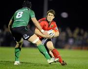 24 March 2012; Ian Keatley, Munster, in action against John Muldoon, Connacht. Celtic League, Connacht v Munster, Sportsground, Galway. Picture credit: Brendan Moran / SPORTSFILE