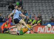24 March 2012; Diarmuid Connolly, Dublin, scores his side's second goal despite the efforts of Anthony Thompson, Donegal. Allianz Football League, Division 1, Round 6, Dublin v Donegal, Croke Park, Dublin. Picture credit: Dáire Brennan / SPORTSFILE