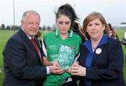 24 March 2012; President of the Ladies Gaelic Football Association Pat Quill and Jacinta Nurney, from Tesco Kinnegad, presents Colaiste Ide agus Iosef team captain Laura Sheeran with her player of the match trophy. Tesco All-Ireland Post Primary Schools Senior A Final, Loreto, Omagh v Colaiste Ide agus Iosef, Limerick, Kinnegad, Co. Westmeath. Picture credit: Matt Browne / SPORTSFILE