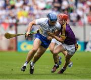 23 July 2017; Michael Walsh of Waterford in action against Willie Devereux of Wexford during the GAA Hurling All-Ireland Senior Championship Quarter-Final match between Wexford and Waterford at Páirc Uí Chaoimh in Cork. Photo by Ray McManus/Sportsfile