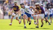 23 July 2017; Maurice Shanahan of Waterford in action against James Breen of Wexford during the GAA Hurling All-Ireland Senior Championship Quarter-Final match between Wexford and Waterford at Páirc Uí Chaoimh in Cork. Photo by Stephen McCarthy/Sportsfile
