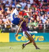 23 July 2017; Stephen Bennett of Waterford in action against Shaun Murphy of Wexford during the GAA Hurling All-Ireland Senior Championship Quarter-Final match between Wexford and Waterford at Páirc Uí Chaoimh in Cork. Photo by Stephen McCarthy/Sportsfile