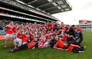 17 March 2012; Loughgiel Shamrocks players and managment celebrate with the Tommy Moore Cup. AIB GAA Hurling All-Ireland Senior Club Championship Final, Coolderry, Offaly, v Loughgiel Shamrocks, Antrim. Croke Park, Dublin. Picture credit: Stephen McCarthy / SPORTSFILE