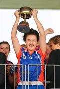 25 March 2012; Niamh NiChaoimh, Mary Immaculate College, Limerick, holds aloft the Giles cup. Giles Cup Final, Mary Immaculate College Limerick v NUI Maynooth, Queen's University Belfast, University Road, Belfast. Picture credit: Oliver McVeigh / SPORTSFILE