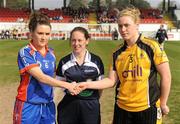 25 March 2012; Mary Immaculate College captain Niamh NiChaoimh, left, and NUI Maynooth captain Grainne McGlade, right, shake hands in front of referee Yvonne Duffy before the game. Giles Cup Final, Mary Immaculate College Limerick v NUI Maynooth, Queen's University Belfast, University Road, Belfast. Picture credit: Oliver McVeigh / SPORTSFILE
