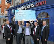 26 March 2012; At the donation of €50,000 to Cancer Research are, from left, Keith O'Loughlin, C.E.O. Boylesports Online, Michael O’Leary, C.E.O. Ryanair, John Boyle, C.E.O. Boylesports, Professor Ken O'Byrne, St. James Hospital and horse trainer Willie Mullins. Grafton Street, Dublin. Photo by Sportsfile