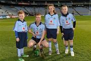 24 March 2012; Mascots Aoife Traynor, from Griffith Ave, Jason Hyland, left, from Edenmore, and Daniel Ryan, from Golden, Co Tipperary, with Dublin captain John McCaffrey before the Allianz Hurling League Game, Croke Park, Dublin. Picture credit: Ray McManus / SPORTSFILE