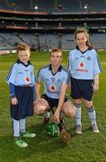 24 March 2012; Mascots Aoife Traynor, from Griffith Ave, and Jason Hyland, from Edenmore, with Dublin captain John McCaffrey before the Allianz Hurling League Game, Croke Park, Dublin. Picture credit: Ray McManus / SPORTSFILE