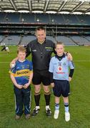 24 March 2012; Mascots Daniel Ryan, right, and Jack Currivan, both from Golden, Co. Tipperary, with referee Brian Gavin before the Allianz Hurling League Game, Croke Park, Dublin. Picture credit: Ray McManus / SPORTSFILE