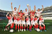 27 March 2012; In attendance at the national launch of the 2012 Kellogg’s GAA Cúl Camps are, front row from left, Daniel Ryan, age 9, Faughs GAA Club, Templeogue, Caoimhe McGarry, age 8,Allen Gaels, Drumshanbo, Niamh Morahan, age 8, Allen Gaels Drumshanbo, Eabha Last, age 9, Kilanerin GAA Club, Wexford, Conor Sullivan, age 10, Kilmacud Crokes, Dublin, Jack Sullivan, age 6, from Howth, Rhiannon Campbell, age 6, Dublin 7 Educate Together N.S., Matthew Ryan, age 11, Faughs GAA Club, Templeogue, with Kellogg’s GAA Cúl Camp Champions, back row from left, Dublin hurler Ryan O’Dwyer, Wexford camogie player Ursula Jacob, Down footballer Benny Coulter, Cork footballer Brid Stack, and Laois manager Justin McNulty. Croke Park, Dublin Picture credit: Brian Lawless / SPORTSFILE