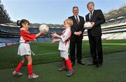 27 March 2012; In attendance at the national launch of the 2012 Kellogg’s GAA Cúl Camps are, Ard Stiúrthóir Páraic Duffy, right, and Jim McNeill, Managing Director, Kellogg’s Ireland, with Rhiannon Campbell, age 6, Dublin 7 Educate Together N.S., and Jack Sullivan, age 6, from Howth. Croke Park, Dublin Picture credit: Brian Lawless / SPORTSFILE