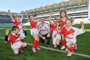 27 March 2012; In attendance at the national launch of the 2012 Kellogg’s GAA Cúl Camps are Laois manager Justin McNulty, with from left, Conor Sullivan, age 10, Kilmacud Crokes, Dublin, Jack Sullivan, age 6, from Howth, Rhiannon Campbell, age 6, Dublin 7 Educate Together N.S., Caoimhe McGarry, age 8, Allen Gaels, Drumshanbo, Eabha Last, age 9, Kilanerin GAA Club, Wexford, and Niamh Morahan, age 8, Allen Gaels Drumshanbo. Croke Park, Dublin Picture credit: Brian Lawless / SPORTSFILE