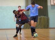 27 March 2012; Niall Hawley, University College Dublin, in action against Maxvd Ntumba, University of Limerick, during the 7th/8th place play-off game. Colleges and Universities Futsal National Cup Finals, Gormanston College, Gormanston Co. Meath. Photo by Sportsfile