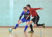 27 March 2012; John Brendan Dobbin, University of Ulster, in action against Pierce Donnachie, I.T. Carlow, during their semi-final game. Colleges and Universities Futsal National Cup Finals, Gormanston College, Gormanston, Co. Meath. Photo by Sportsfile