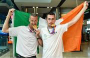 24 July 2017; Micheal McKillop of Team Ireland, right, who won gold in both the T38 800m and T37 1500m, pictured with his father Paddy McKillop during the Homecoming of the Irish Team from the World Para Athletics Championships in London at Dublin Airport. Photo by Sam Barnes/Sportsfile