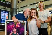 24 July 2017; Team Ireland Athlete Niamh McCarthy, who won silver in the F41 Discus, pictured with her parents Caroline and Flor during the Homecoming of the Irish Team from the World Para Athletics Championships in London at Dublin Airport. Photo by Sam Barnes/Sportsfile