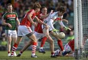 22 July 2017; David Clarke of Mayo under pressure from Paul Kerrigan, centre, and Ian Maguire of Cork during the GAA Football All-Ireland Senior Championship Round 4A match between Cork and Mayo at Gaelic Grounds in Co. Limerick. Photo by Piaras Ó Mídheach/Sportsfile