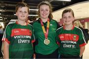 24 July 2017; Michaela Walsh, who won bronze in the Hammer, pictured with her cousins Mikey Gallagher, left, age 13, and Dylann Gallagher, age 10, at the homecoming of the Irish Team from the European Athletics Under-20 Championships in Italy at Dublin Airport. Photo by Sam Barnes/Sportsfile