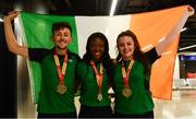 24 July 2017; Team Ireland's medallists, from left, John Fitzsimons who won bronze in the 800m, Gina Apke-Moses, who won gold in the 100m and Michaela Walsh who won bronze in the Women's Hammer, pictured during the Homecoming of the Irish Team from the European Athletics Under-20 Championships in Italy at Dublin Airport. Photo by Sam Barnes/Sportsfile