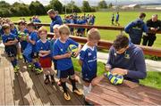 26 July 2017; Max Deegan of Leinster signs autographs during the Bank of Ireland Leinster Rugby Summer Camp at Clondalkin RFC in Dublin. Photo by Sam Barnes/Sportsfile