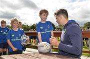 26 July 2017; Max Deegan of Leinster signs an autograph for Sean Noud during the Bank of Ireland Leinster Rugby Summer Camp at Clondalkin RFC in Dublin. Photo by Sam Barnes/Sportsfile