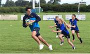 26 July 2017; Leinster's Joey Carbery in action with Rosa Phelan, Sam Mackey and Amber McDonagh during the Bank of Ireland Leinster Rugby Summer Camp at Kilkenny RFC in Kilkenny. Photo by Matt Browne/Sportsfile