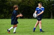 26 July 2017; Shane Moore, right, passes to Claus Biernoth, during the Bank of Ireland Leinster Rugby School of Excellence, at The King's Hospital in Dublin. Photo by Sam Barnes/Sportsfile