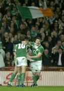 24 February 2007; Ireland's Ronan O'Gara, 10, and Brian O'Driscoll celebrate with team-mate Shane Horgan after Horgan scored their side's third try. RBS Six Nations Rugby Championship, Ireland v England, Croke Park, Dublin. Picture Credit: Brendan Moran / SPORTSFILE