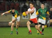 24 March 2012; Aidan Cassidy, Tyrone, in action against Conor Gillespie and Donnacha Tobin, Meath. Allianz Football League, Division 2, Round 6, Tyrone v Meath, Healy Park, Omagh, Co. Tyrone. Picture credit: Oliver McVeigh / SPORTSFILE