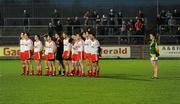 24 March 2012; The Tyrone team stand for the National Anthem with Seamus Kenny, Meath, close by. Allianz Football League, Division 2, Round 6, Tyrone v Meath, Healy Park, Omagh, Co. Tyrone. Picture credit: Oliver McVeigh / SPORTSFILE