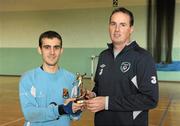 27 March 2012; Gerard Dunne, FAI, presents the Man of the Match award from the final to University College Cork's joint captain and goalkeeper Roberto Bernabeam Verdu. Colleges and Universities Futsal National Cup Finals, Gormanston College, Gormanston, Co. Meath. Photo by Sportsfile