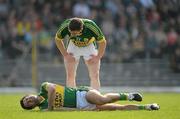 25 March 2012; Kerry's Aidan O'Mahony lies injured as team-mate Marc O Se looks on. Allianz Football League Division 1, Round 6, Kerry v Laois, Fitzgerald Stadium, Killarney, Co. Kerry. Picture credit: Brendan Moran / SPORTSFILE