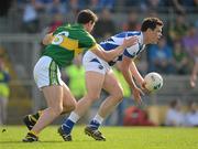 25 March 2012; John O'Loughlin, Laois, in action against Eoin Brosnan, Kerry. Allianz Football League Division 1, Round 6, Kerry v Laois, Fitzgerald Stadium, Killarney, Co. Kerry. Picture credit: Brendan Moran / SPORTSFILE