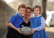 28 March 2012; Leinster and Ireland Rugby scrum-half Eoin Reddan launches John Scottus National School’s new sports pitch which has been redeveloped with sponsorship from Aviva Stadium, Dublin City Council, parents and a local donor. In attendance at the launch is Leinster and Ireland Rugby scrum-half Eoin Reddan with John Scottus National School pupils Harry Pierce, age 6, and Lulu Murray, age 5. John Scottus, Northumberland Road, Dublin. Picture credit: Stephen McCarthy / SPORTSFILE