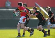 28 March 2012; Evan Mintern, CBC, is tackled by Jack O'Donnell, Ardscoil Ris. Avonmore Milk Schools Munster Junior Cup Final, CBC, Cork v Ardscoil Ris, Limerick, Musgrave Park, Cork. Picture credit: Diarmuid Greene / SPORTSFILE