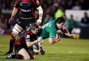 30 March 2012; Mike McCarthy, Connacht, is tackled by Wayne Evans, Dragons, just short of the try line. Celtic League, Dragons v Connacht, Rodney Parade, Newport, Wales. Picture credit: Steve Pope / SPORTSFILE