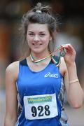 31 March 2012; Winner of the Girls Under 19 High Jump Emily Rogers, St. Peter's Athletic Club, Dromiskin, Co. Louth, with her gold medal. Rogers won the event with a jump of 1.17m. Woodie’s DIY AAI Juvenile Indoor Championships of Ireland, Nenagh Indoor Arena, Nenagh, Co. Tipperary. Picture credit: Matt Browne / SPORTSFILE