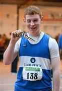 31 March 2012; Winner of the Boys Under 17 Shot Putt John Kelly, Finn Valley Athletic Club, Co. Donegal, with his gold medal. Woodie’s DIY AAI Juvenile Indoor Championships of Ireland, Nenagh Indoor Arena, Nenagh, Co. Tipperary. Picture credit: Matt Browne / SPORTSFILE