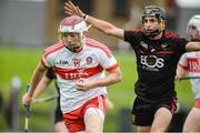 26 July 2017; Brian Cassidy of Derry in action against Liam Savage of Down during the Bord Gáis Energy Ulster GAA Hurling U21 Championship Final match between Derry and Down at Corrigan Park in Belfast. Photo by Oliver McVeigh/Sportsfile