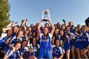 26 July 2017; Annie Fitzgerald captain of Waterford lifts the cup as her team-mates celebrate after the All Ireland Ladies Football during the All Ireland Ladies Football Under 16 B Final match between Kildare and Waterford at John Locke Park in Callan, Co Kilkenny. Photo by Matt Browne/Sportsfile