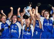 26 July 2017; Annie Fitzgerald captain of Waterford lifts the cup as her team-mates celebrate after the All Ireland Ladies Football during the All Ireland Ladies Football Under 16 B Final match between Kildare and Waterford at John Locke Park in Callan, Co Kilkenny. Photo by Matt Browne/Sportsfile
